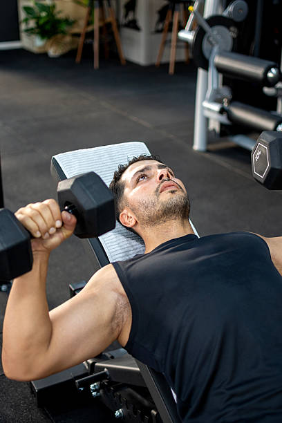istock Personal trainer posing in the gym 2225799332