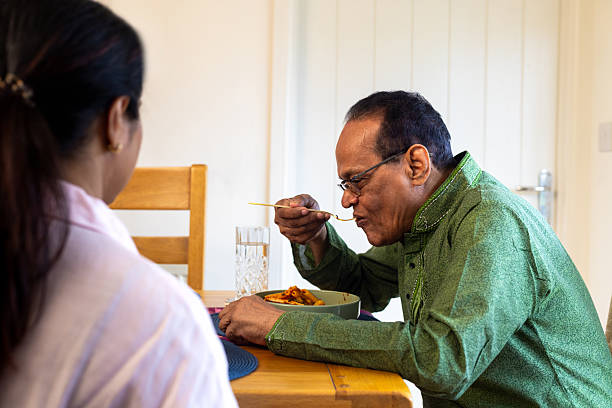 istock Catching Up Over a Home Meal 2225804606