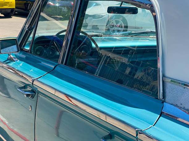 istock Vintage Turquoise Car Interior .Chrome Trim, Steering Wheel, and Dashboard Details 2225808888