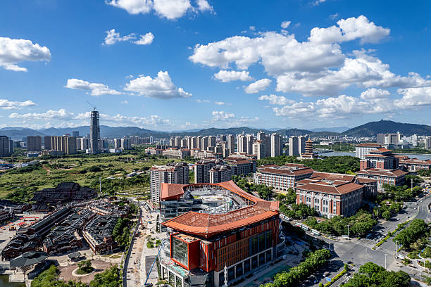 istock An aerial shot captures a modern cityscape under a clear blue sky. 2225810107