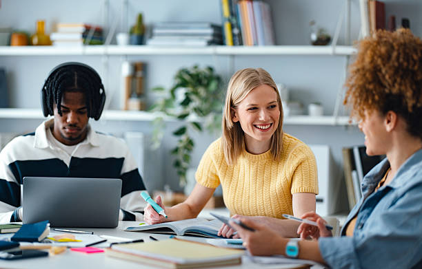 istock Group of Students Studying and Sharing Ideas in a Bright Study Area 2225813961