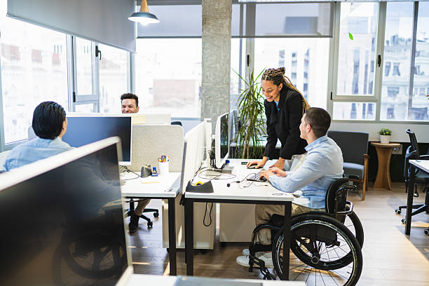 istock Young professionals collaborating in a modern coworking space 2225815116