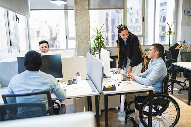 istock Young professionals collaborating in a modern coworking space 2225818478
