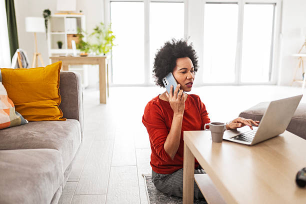 istock Happy African American Freelancer Taking Phone Call 2225821435