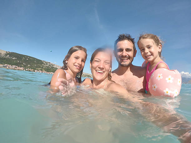 istock Young family enjoying vacation 2225826766