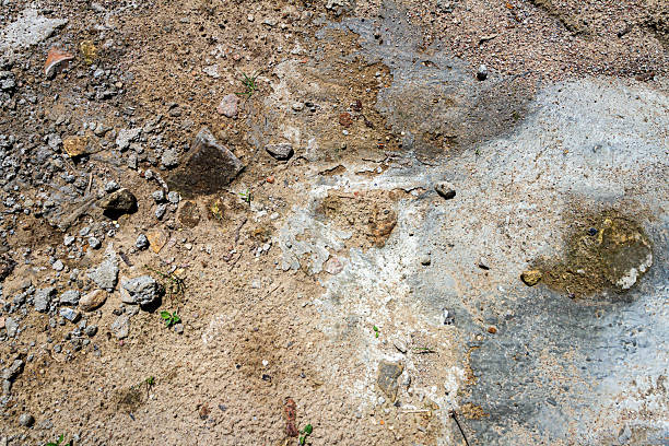 Concrete and cement stains on ground. Abstract messy construction background