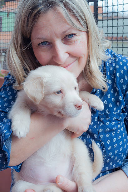 istock Woman and her dog 2225827969