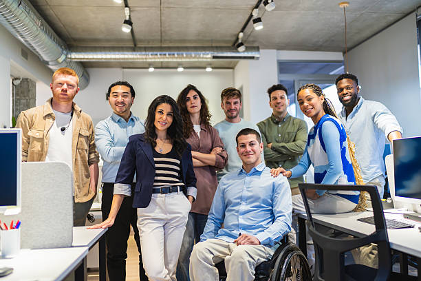 istock Confident business team posing in modern coworking space 2225828936
