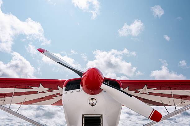 istock Front view of red and white aircraft propeller and wing with bold star design 2225830000