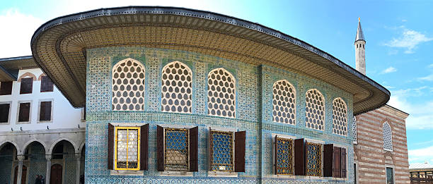 istock Rounded building with domed roof and arched windows in layered architectural style 2225837079
