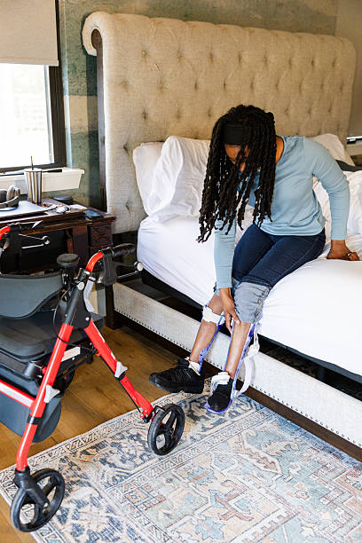istock African-American Woman Using Walker in Bedroom 2225837869