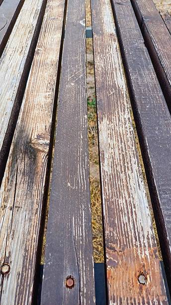 istock Wooden table surface and texture. Wood brown backgrounds and text space 2225838926