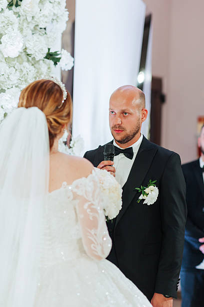 istock The bride is wearing a white dress and a veil 2225840585