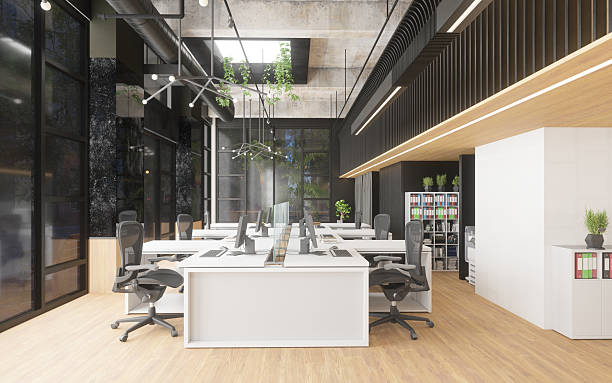 istock Empty modern office interior with desks, computer, and chairs. Contemporary workspace design for business productivity. 2225840998