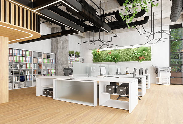 istock Modern open plan office space with white desks and natural wood flooring. Collaborative workplace interior for productivity. 2225840999