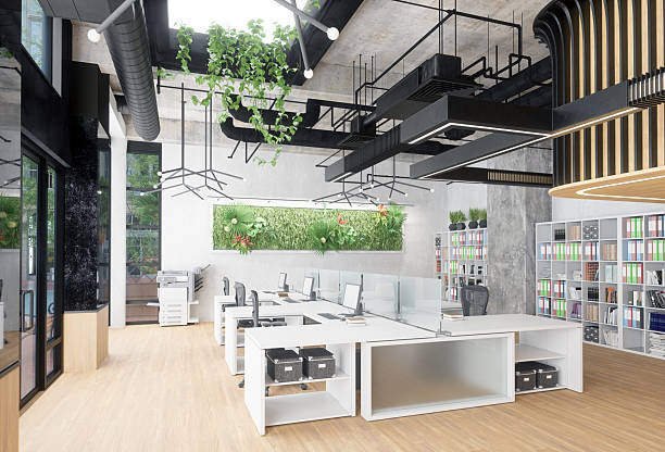 istock Modern office interior with white desks and green plants. Contemporary workspace design for productivity and healthy environment. 2225841021
