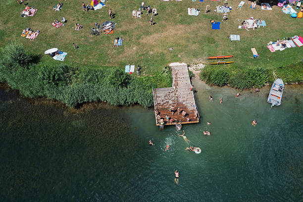 istock People swimming and sunbathing 2225841793