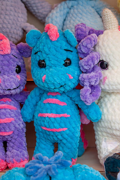 istock New soft knitted toys, hand made from yarn. 2225846329