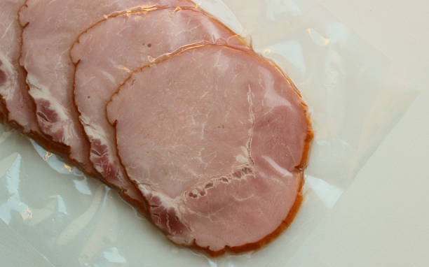 istock Pink ham sealed in a plastic package for long term storage 2225847360