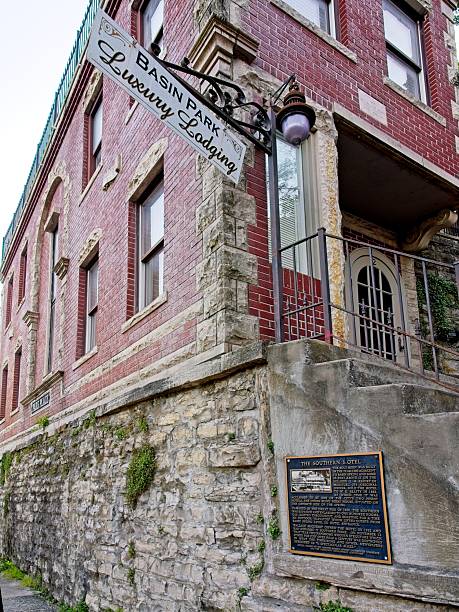 Eureka Springs, Arkansas - USA, May 9, 2025. Old Southern Hotel now Basin Park lodging in Eureka Springs. Quaint downtown architecture in the middle of the Ozark mountain community of Eureka Springs Arkansas.