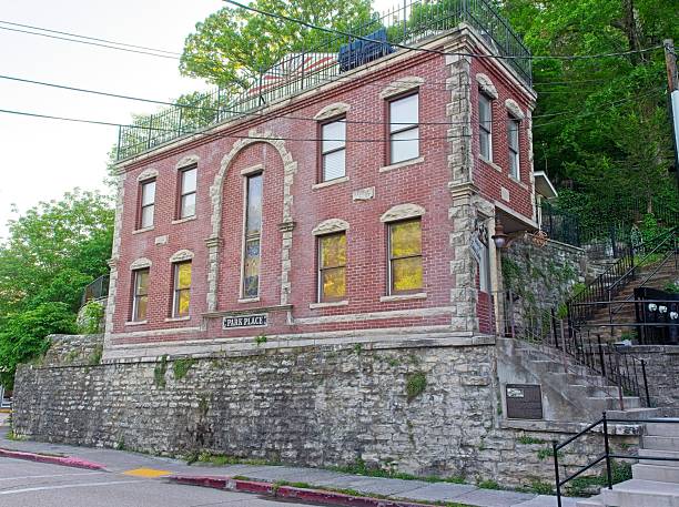 Eureka Springs, Arkansas - USA, May 9, 2025. Old Southern Hotel now Basin Park lodging in Eureka Springs. Quaint downtown architecture in the middle of the Ozark mountain community of Eureka Springs Arkansas.
