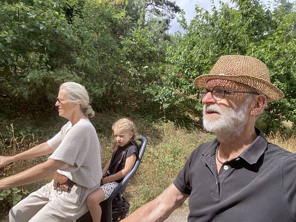 Grandparents with there Granddaughter on a close Bike Tour.