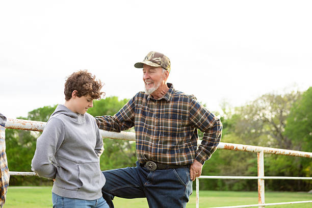istock Grandfather and Grandson Bonding Outdoors in Texas 2225857375