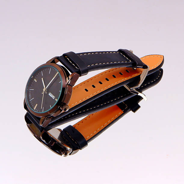 istock Black leather watch isolated on mirror reflection background close-up view 2225859372