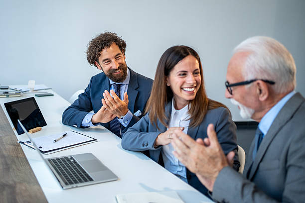 istock Business people clapping hands during a meeting in the office 2225862375