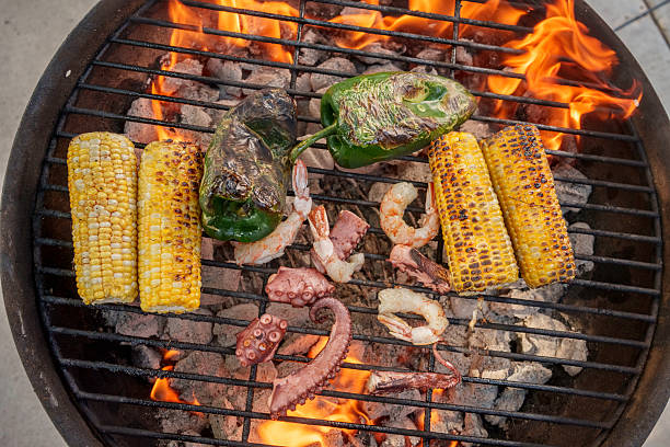Grilled Shrimp, Octopus, Corn, and Peppers Over Open Flame