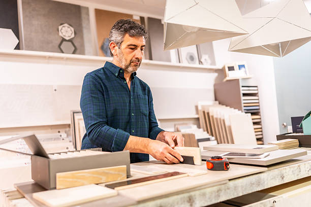 istock Architect choosing materials for bathroom renovation in a home improvement store 2225864255