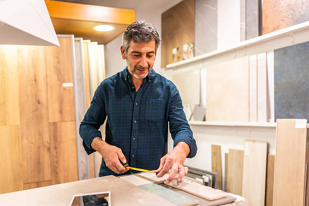 istock Architect choosing tiles and parquet in a home improvement store 2225864256