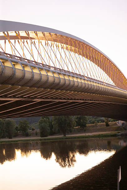 istock A beautiful bridge over water, with trees in the background 2225868318