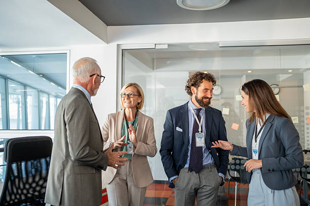 istock Business people chatting during a conference break 2225874891