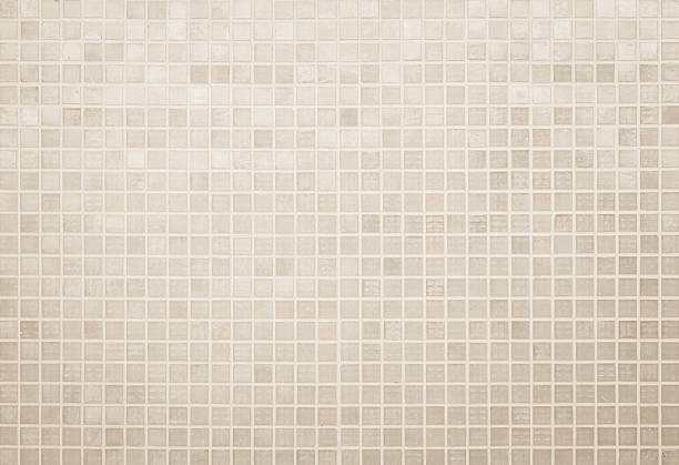istock Cream light ceramic wall and floor tiles mosaic background in bathroom and kitchen. Design pattern geometric with grid wallpaper texture decoration pool. Simple seamless abstract surface clean. 2225889743