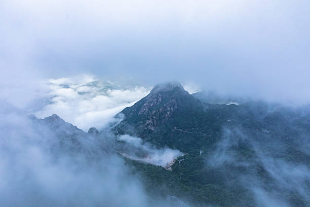 The mountaintop covered in clouds and mist