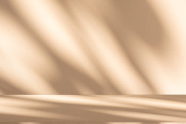 istock Studio style background wall decoration presentation uses white and beige tones. with shadows cast from a nearby window, concept creating a decorative 2225904147