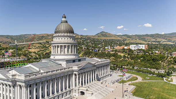 istock Utah State Capitol building with wealthy suburban districts and mountain backdrop. Neoclassical architecture in Salt Lake City. 2225916939