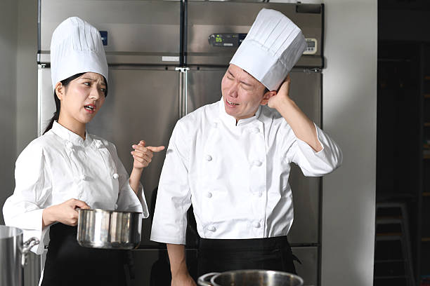 man in chef's uniform cooking work profession. High quality photo
