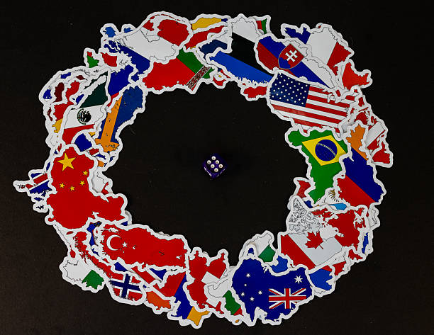 Single Die Centered in Circle of World Flags Representing Global Decision