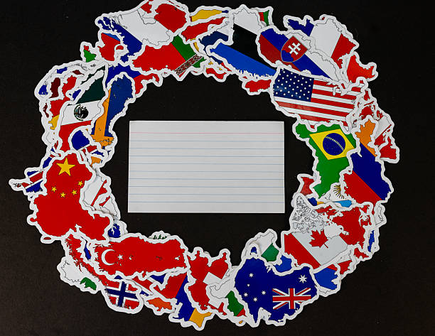 istock Blank Index Card Framed by World Map Flags on Black Background 2225927751