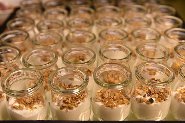 Granola yogurt presentation in a glass bowl