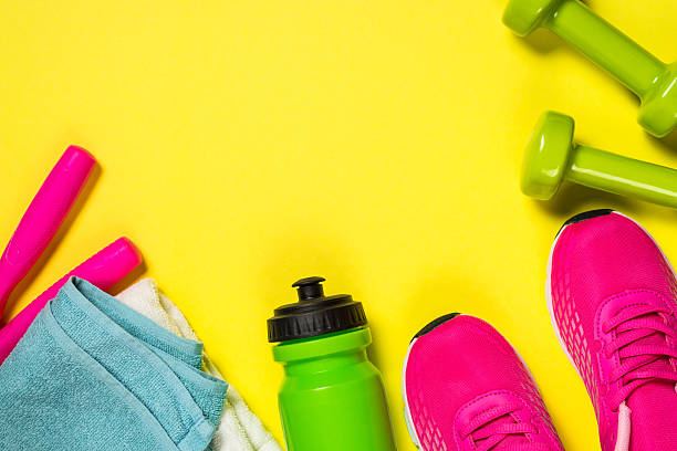 istock Fitness equipment flat lay image on color background. 2225941236
