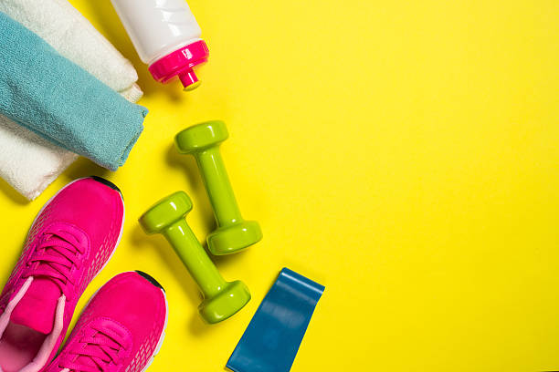 istock Fitness equipment flat lay image on color background. 2225941320