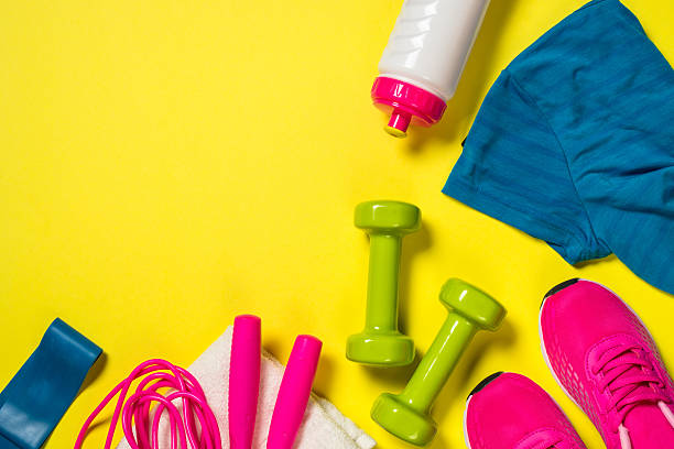 istock Fitness equipment flat lay image on color background. 2225941324