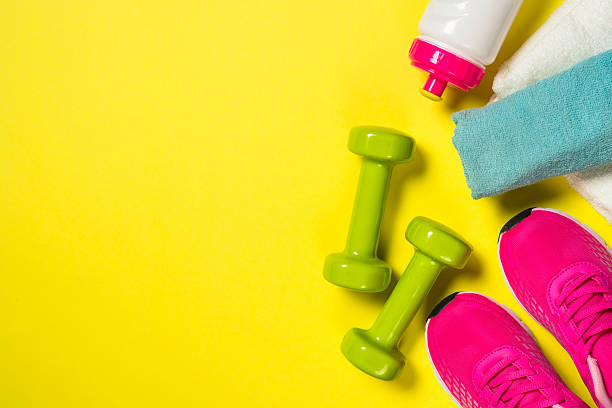 istock Fitness equipment flat lay image on color background. 2225941331