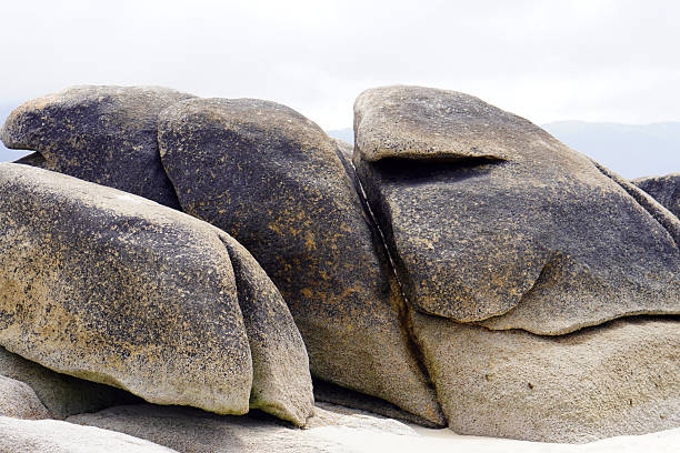 vacation destinations, large rocks on the beach.