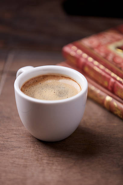 Cup of coffee on wooden background. Soft focus. Copy space.