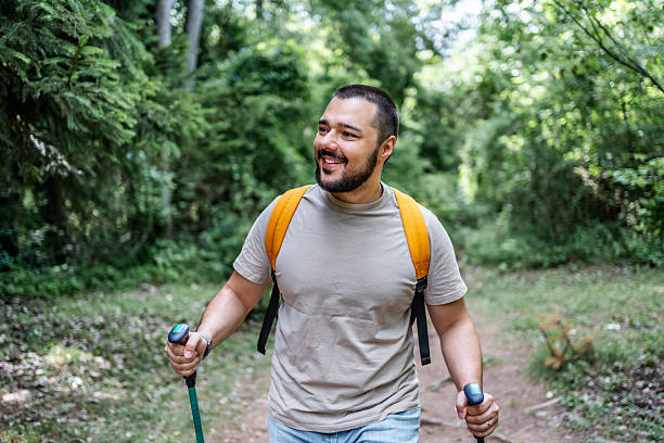istock Young male hiker enjoying scenic forest trail 2225949803