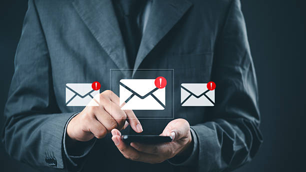 istock Email notifications and alert icons on phone mobile email overload and digital risk. business communication and inbox security digital communication, spam warning, and phishing threat. 2225953068